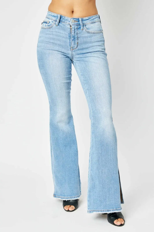 Judy Blue Full Size Mid Rise Raw Hem Slit Flare Jeans.