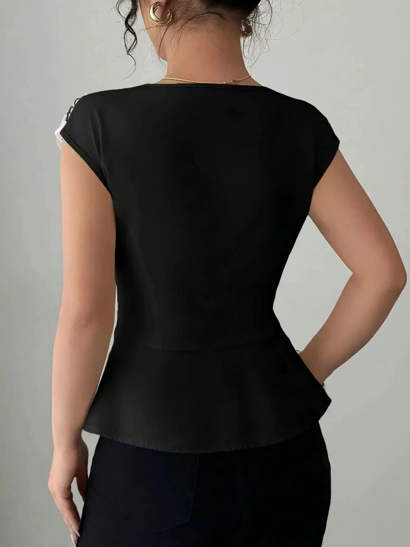 Floral Cap Sleeve Peplum Blouse.