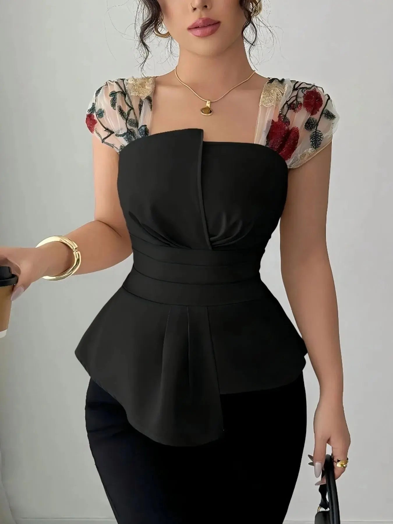 Floral Cap Sleeve Peplum Blouse.