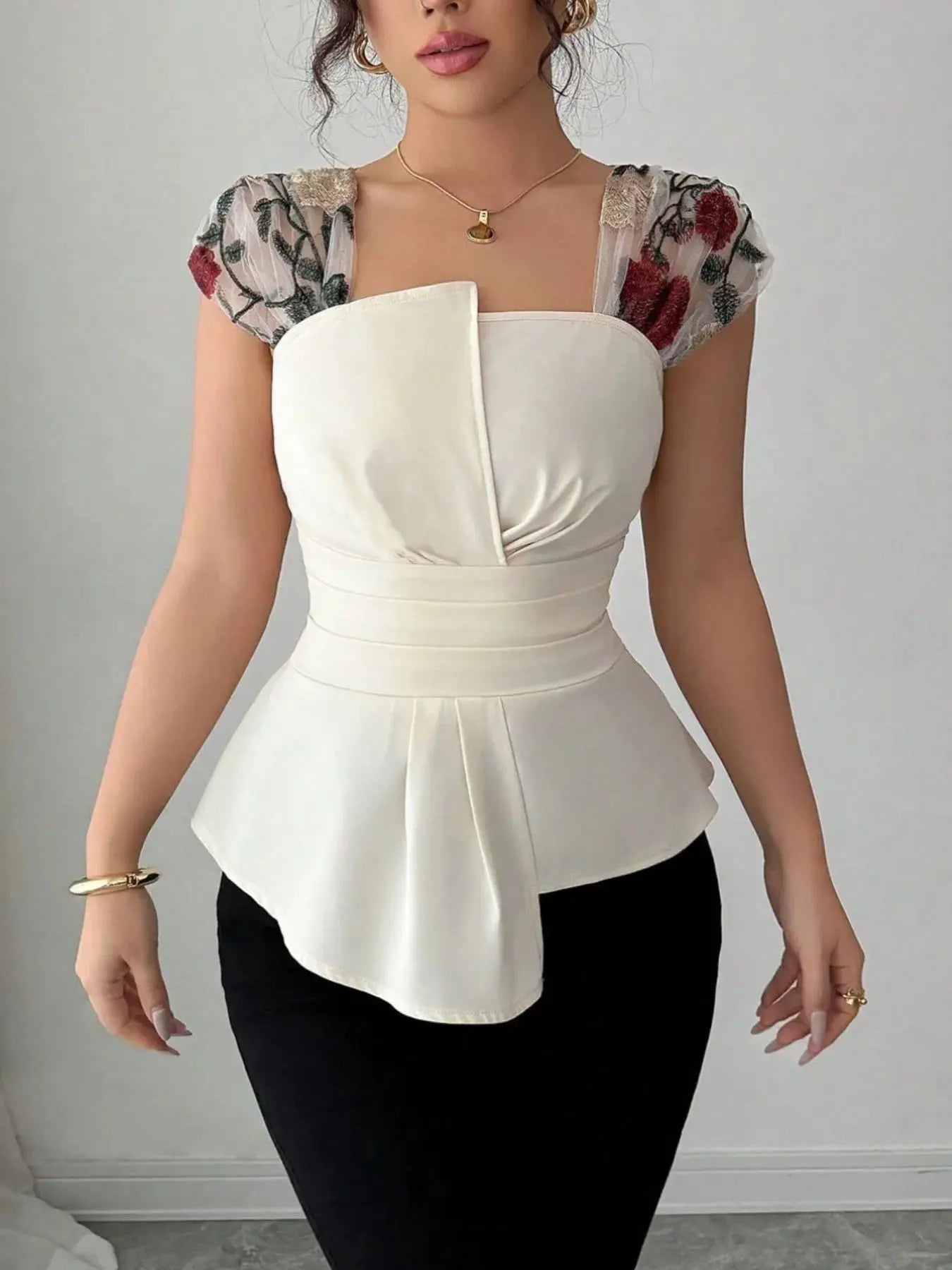 Floral Cap Sleeve Peplum Blouse.